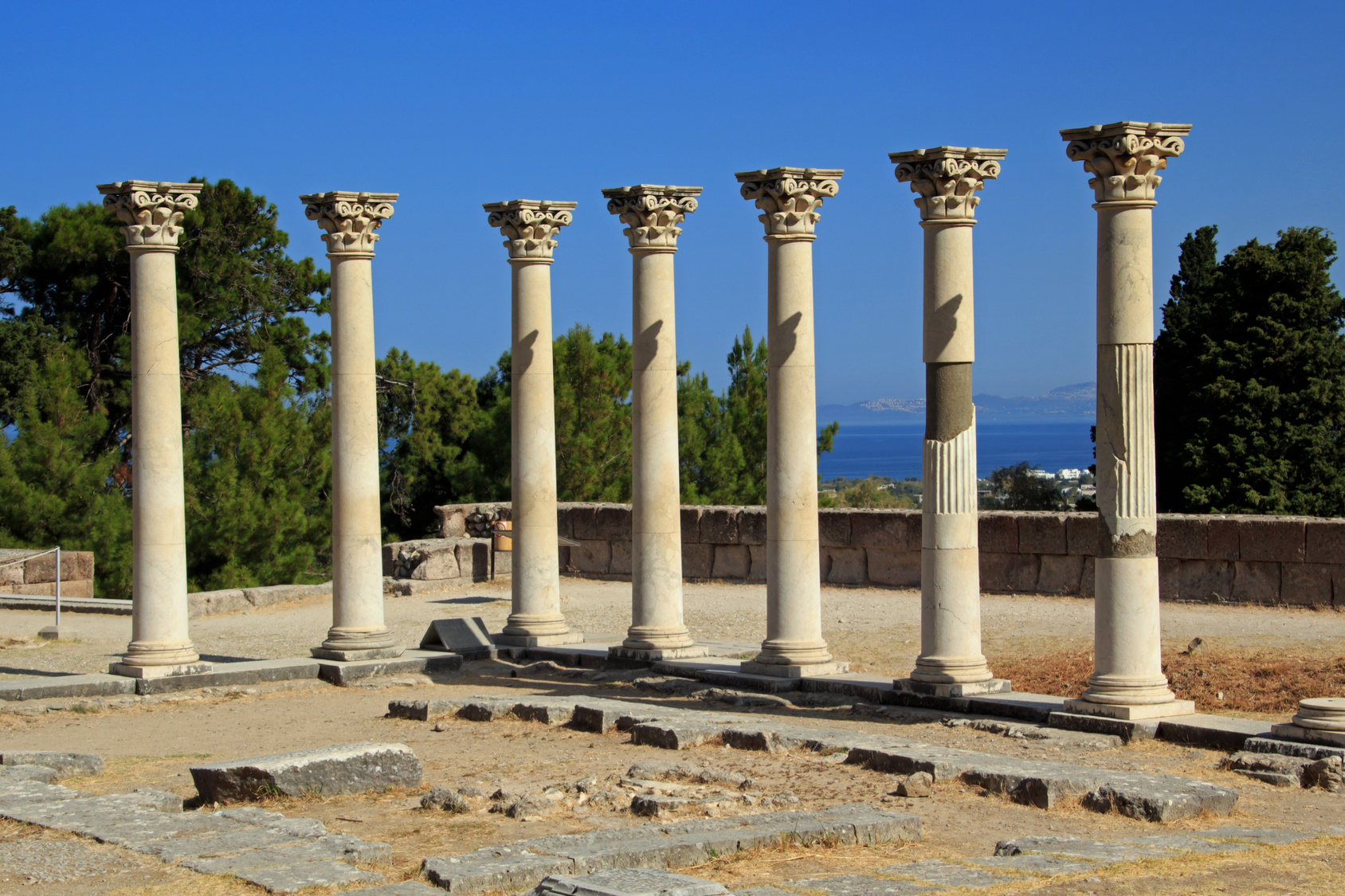 Column ruins with sea in the background